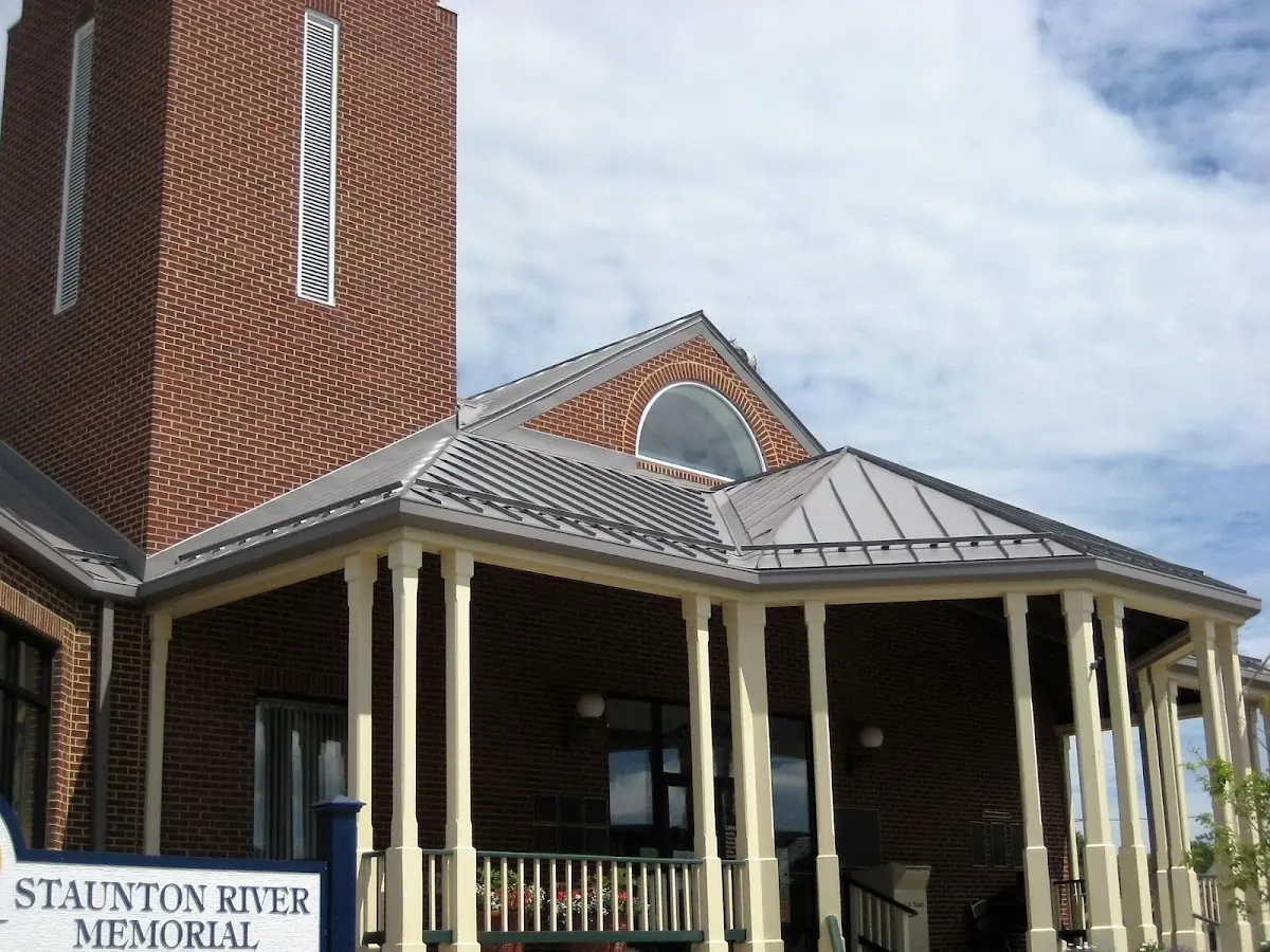 Skilled roofing craftsmen working on a residential roof in Mobile City